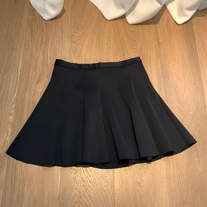 Black mini skirt, matches with everything, can be dressed up or down!
